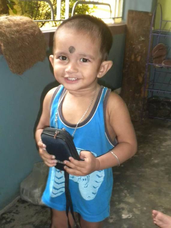 Toddler holding a camera